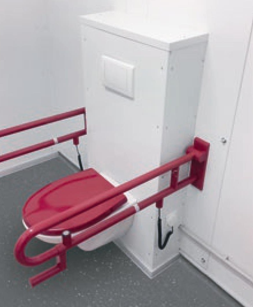 WC PMR équipé de barres d’appui dans un module sanitaire